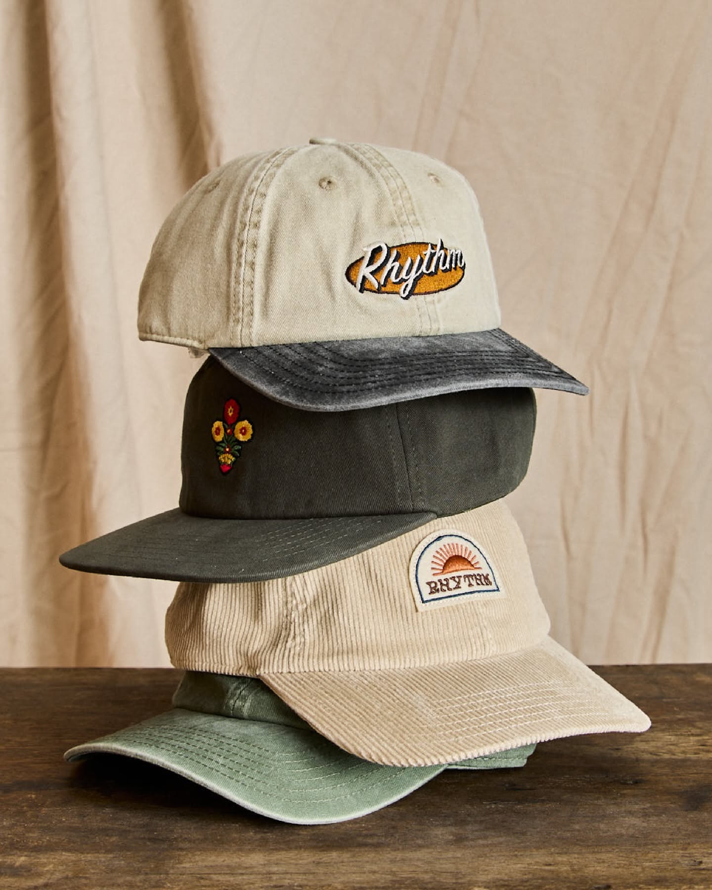 Stacked Fashion Baseball Caps Product Photography Prompt