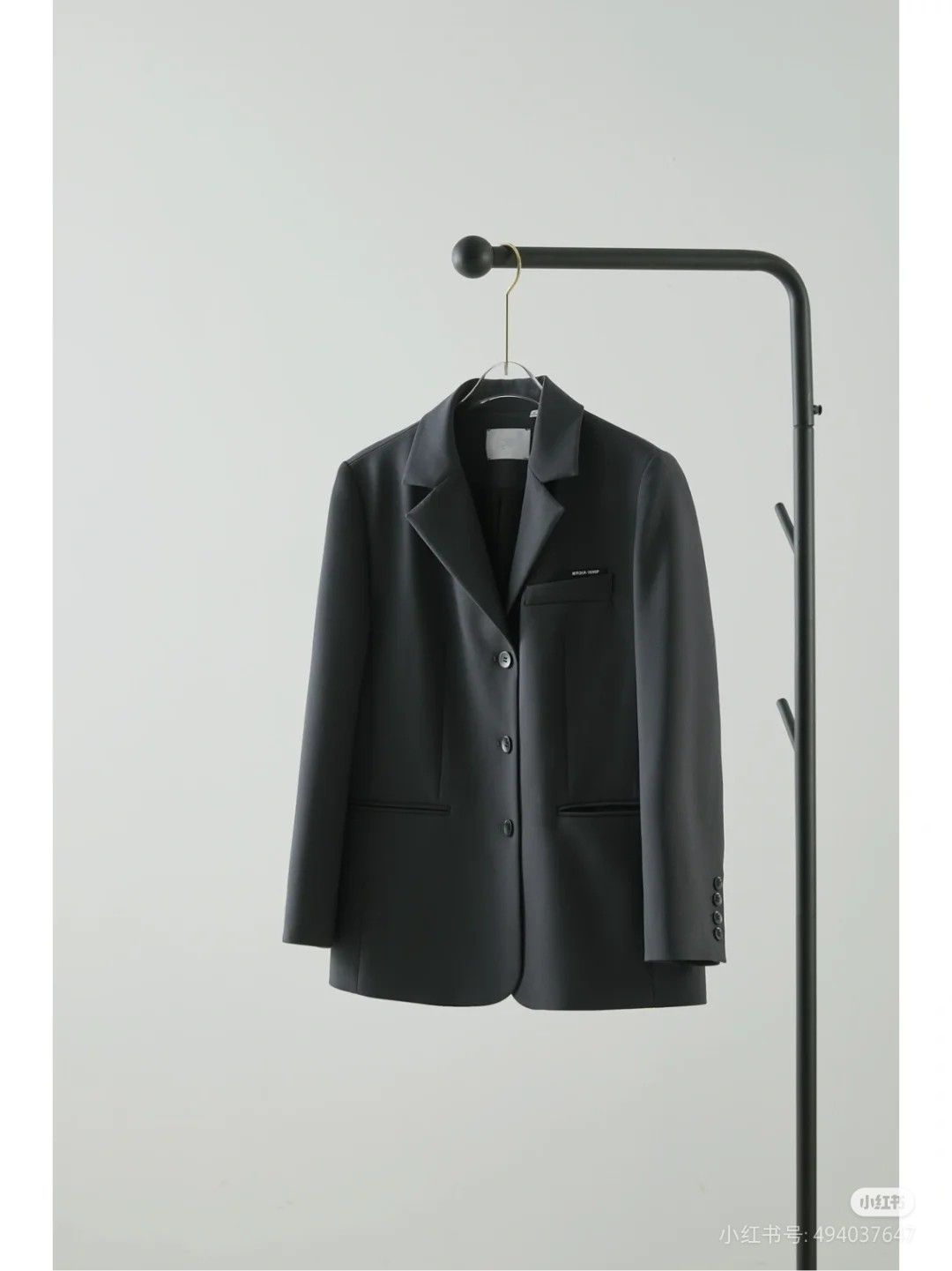 Minimalist Charcoal Blazer Jacket Product Photography Prompt