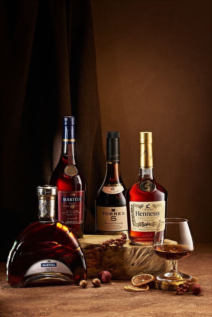 Cognac and Brandy Bottle Lineup Product Photography Prompt