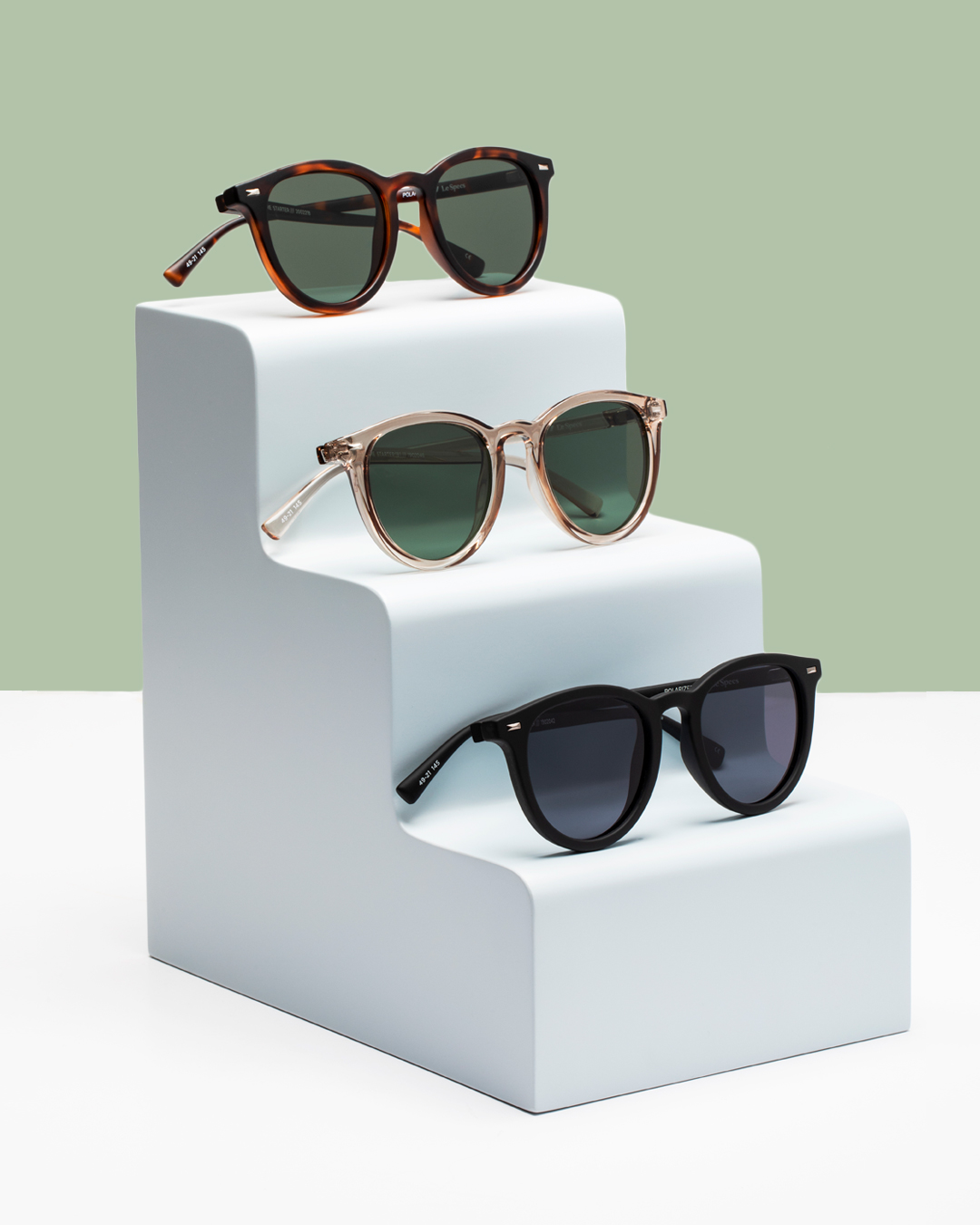 Sunglasses Tiered Pedestal Product Photography Prompt
