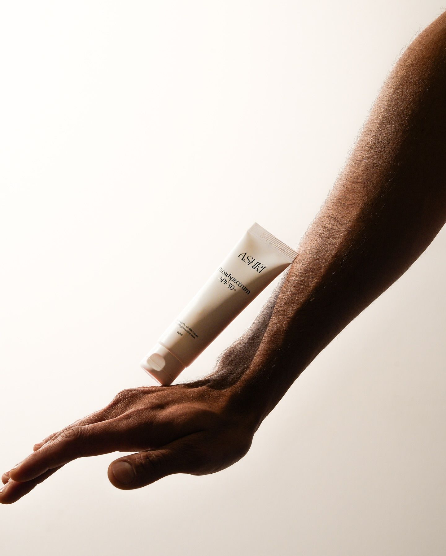 Minimal Sunscreen Tube Product Photography Prompt
