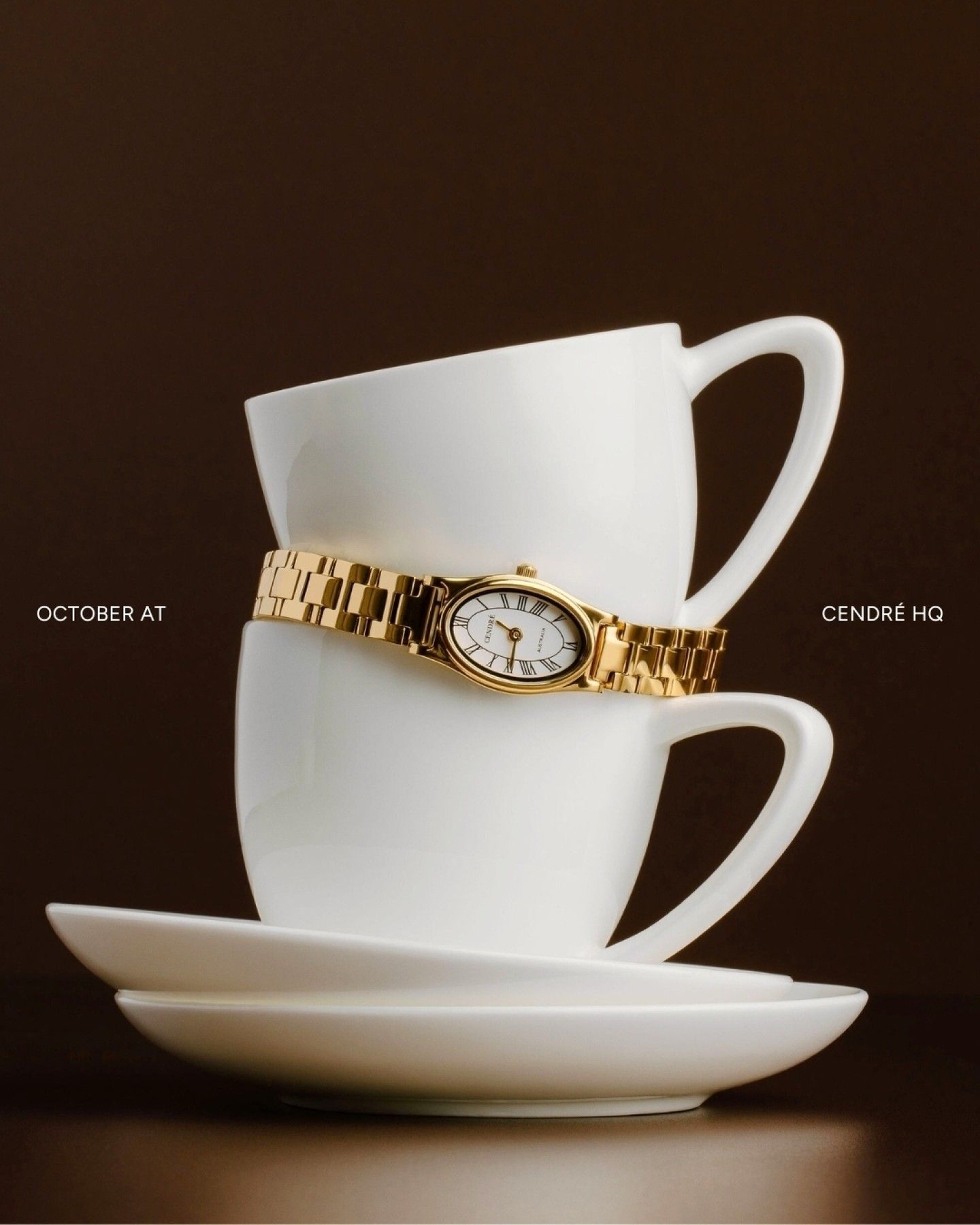 Gold Dress Watch with Teacups Product Photography Prompt