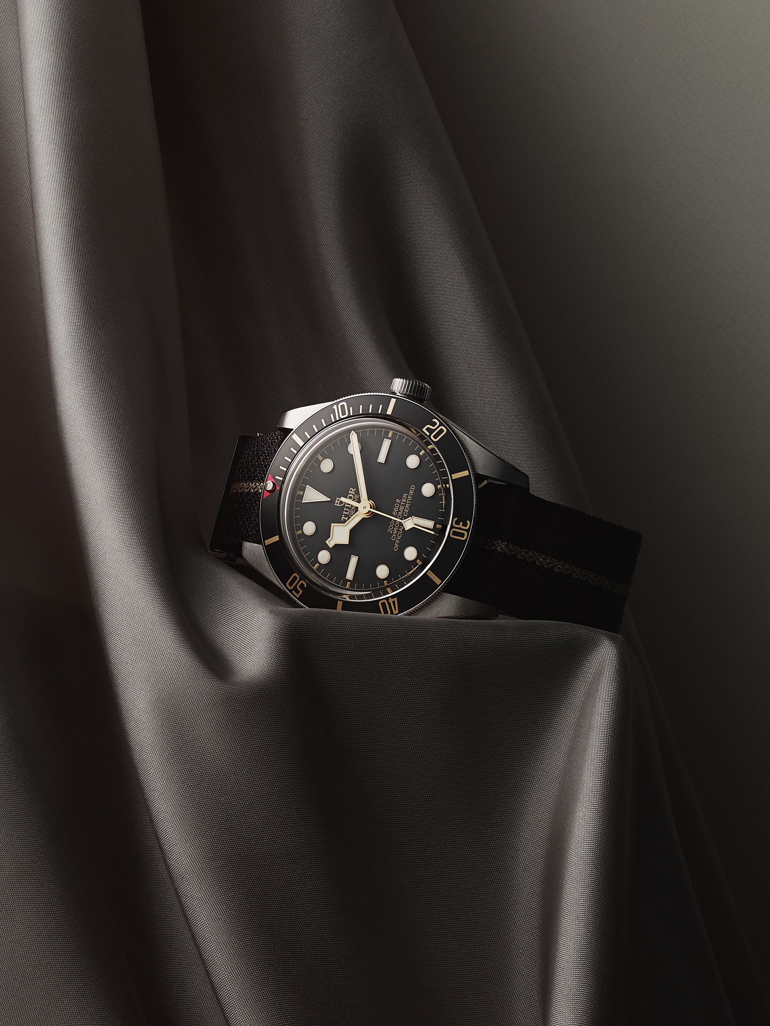 Luxury Dive Watch on Silk Drapery Product Photography Prompt
