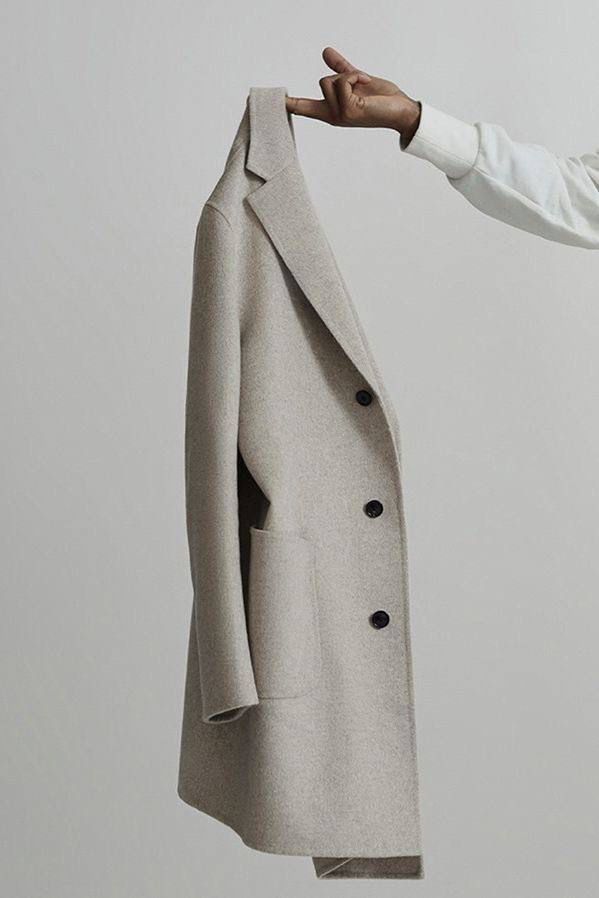 Overcoat Minimalist Studio AI Prompt