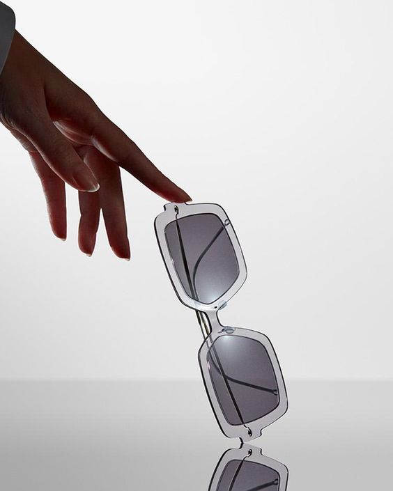 Minimal Sunglasses Product Photography Prompt