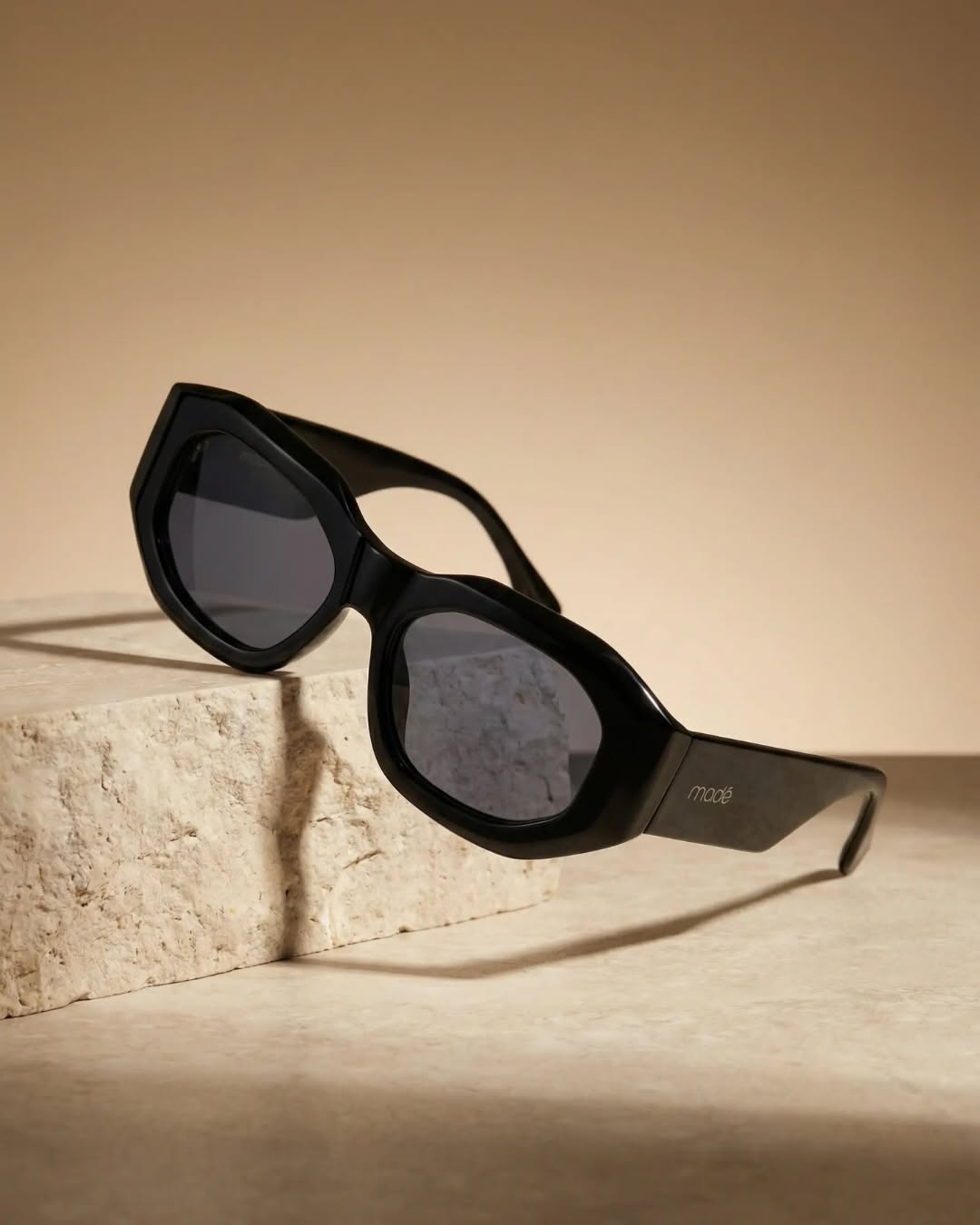 Black Geometric Sunglasses Product Photography Prompt