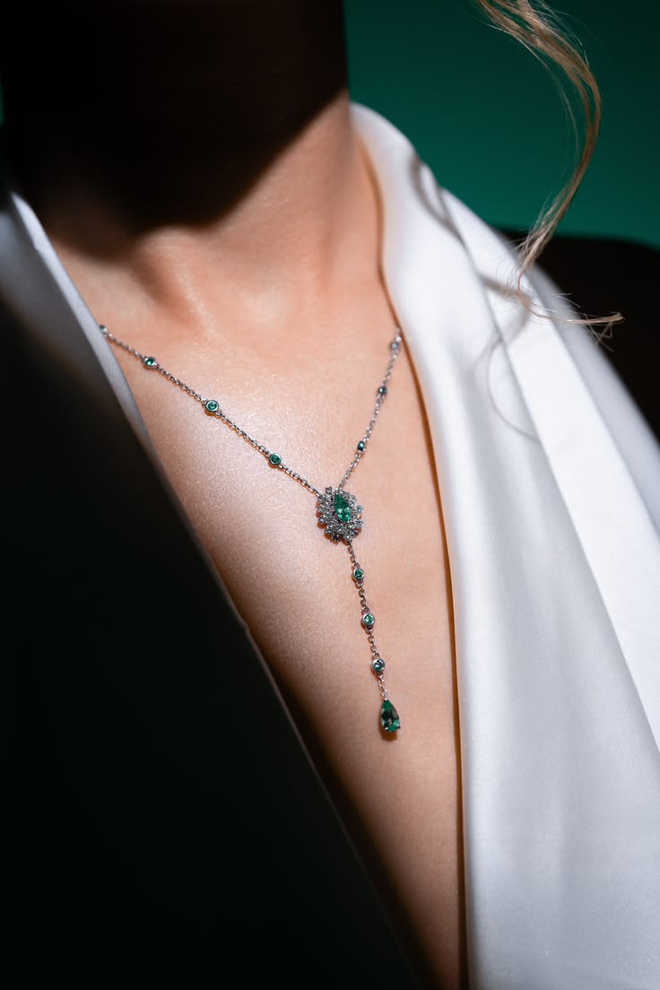 Editorial Emerald Drop Necklace on Draped Décolletage