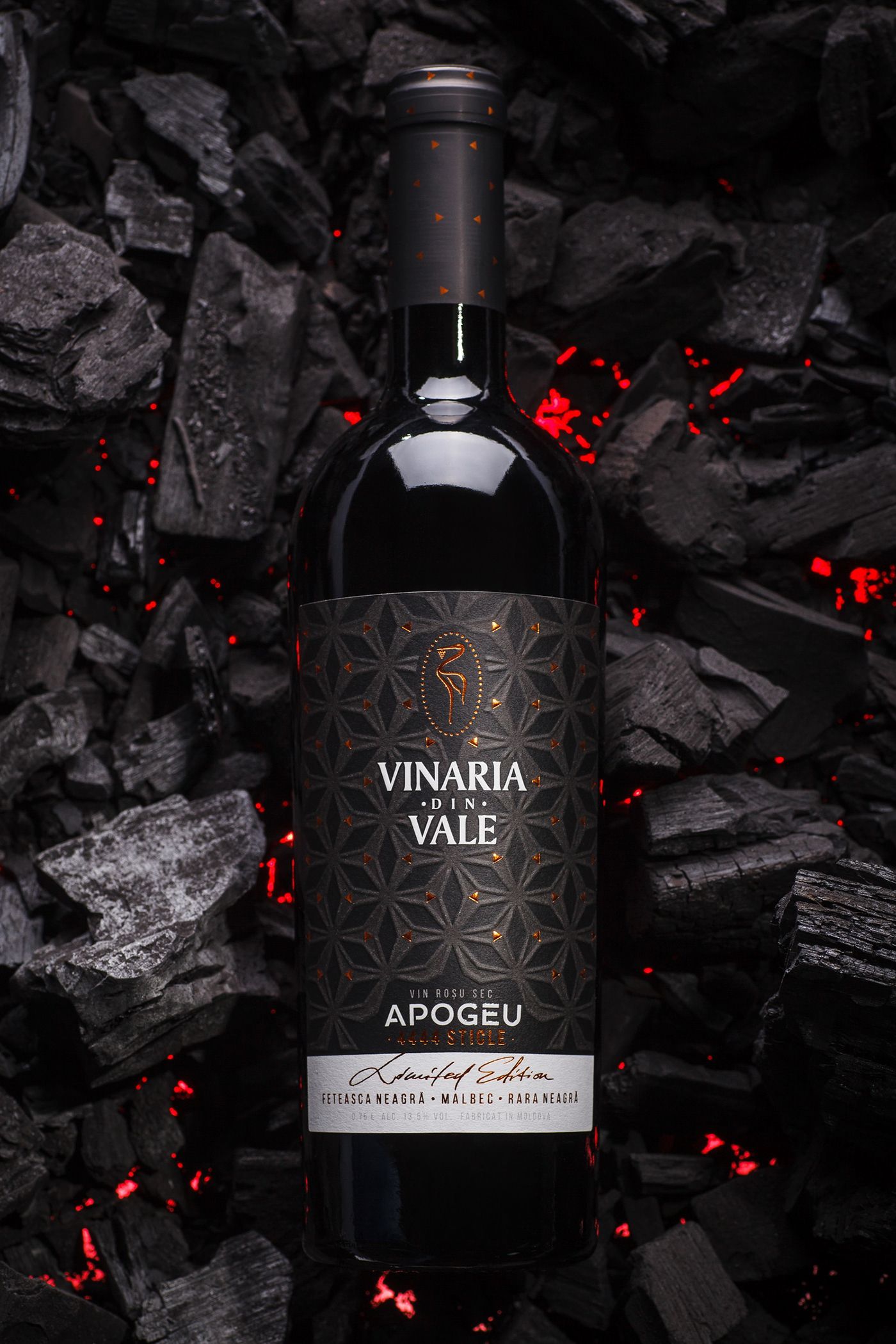 Luxury Red Wine Bottle in Glowing Charcoal Product Photography Prompt
