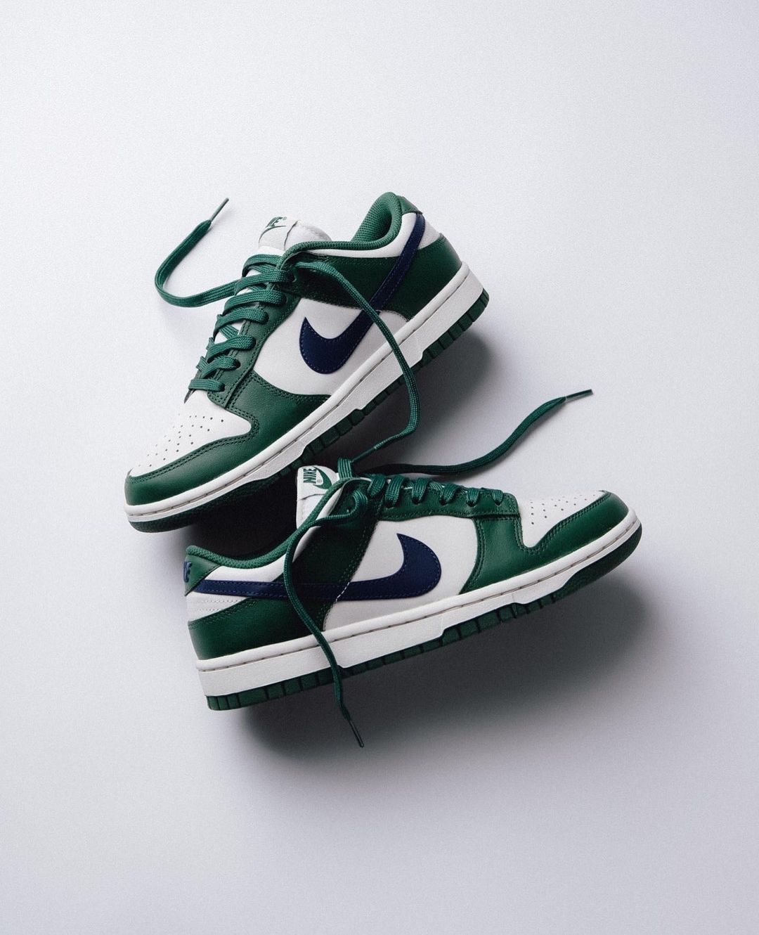 Green and White Low-Top Sneakers Product Photography AI Prompt