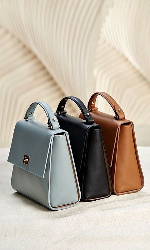 Luxury Handbag Trio Product Photography Prompt